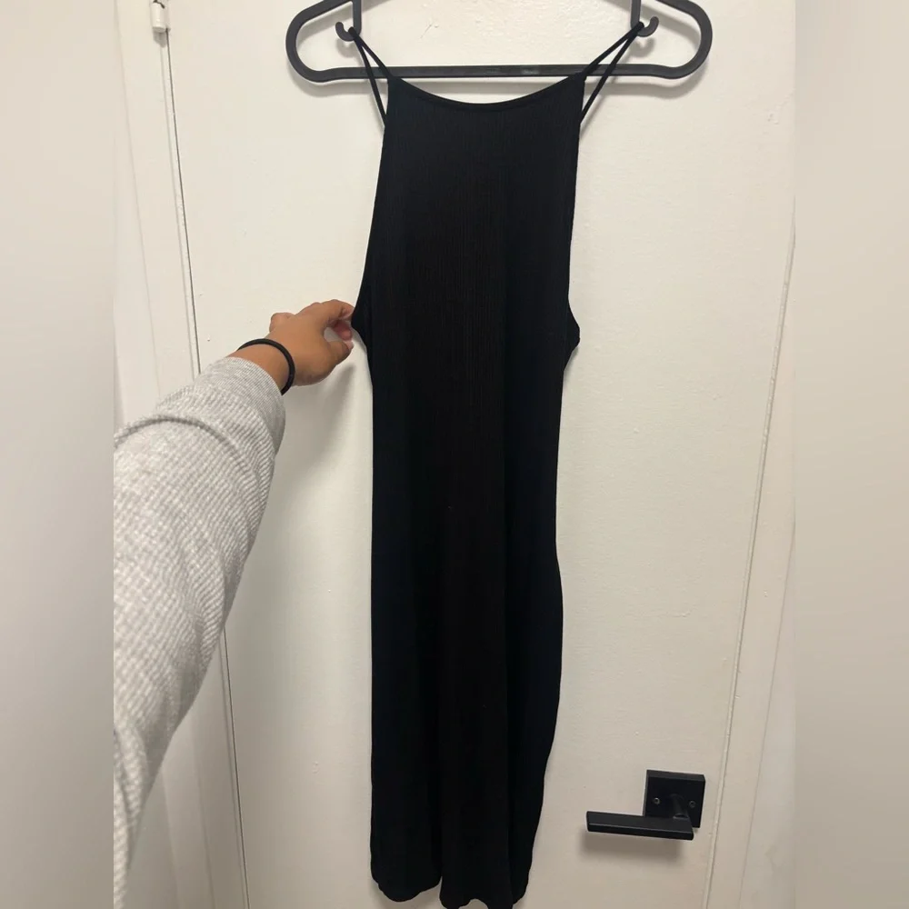 Like New H&M black ribbed halter dress with open back and tie detail size M Like New H&M black ribbed halter dress with open back and tie detail size M